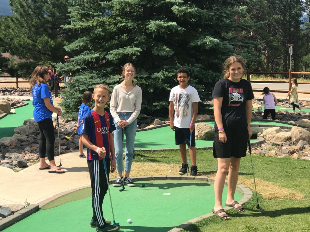 Playing mini-golf at the YMCA