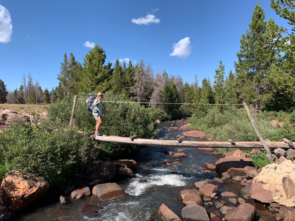 Crossing Henry's Fork on the log bridge on the way to Kings Peak