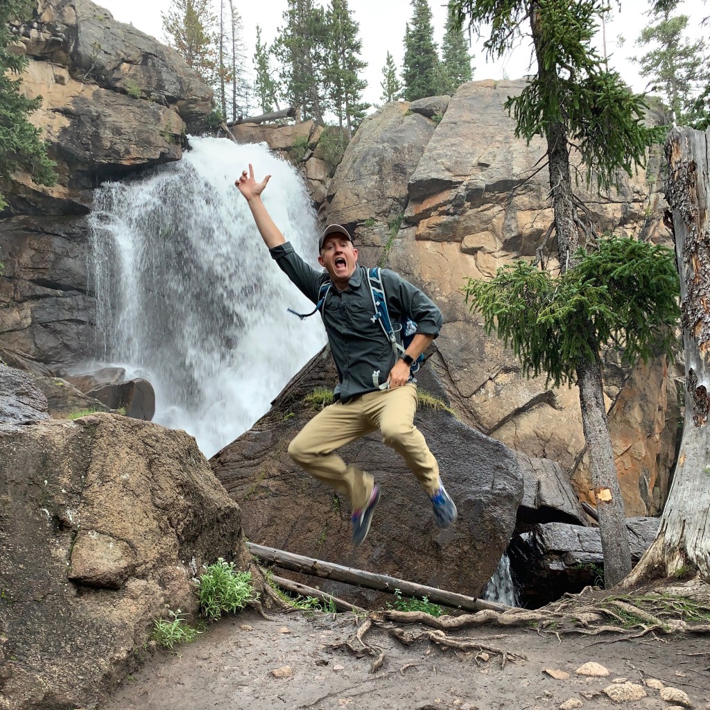 Seth jumping for joy at Ouzel Falls